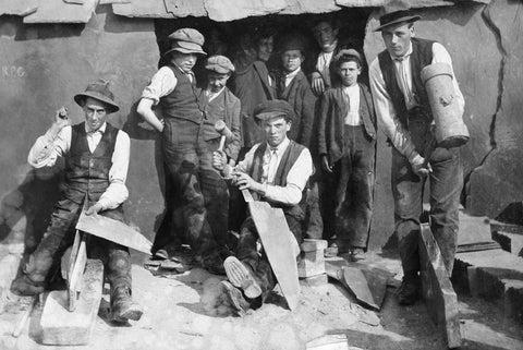 Six men and four boys splitting and dressing at Dinorwig